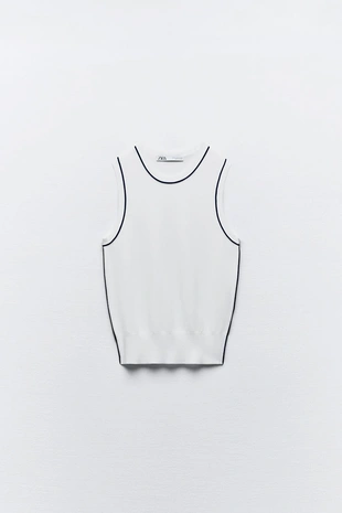 Однотонный топ с контрастной окантовкой