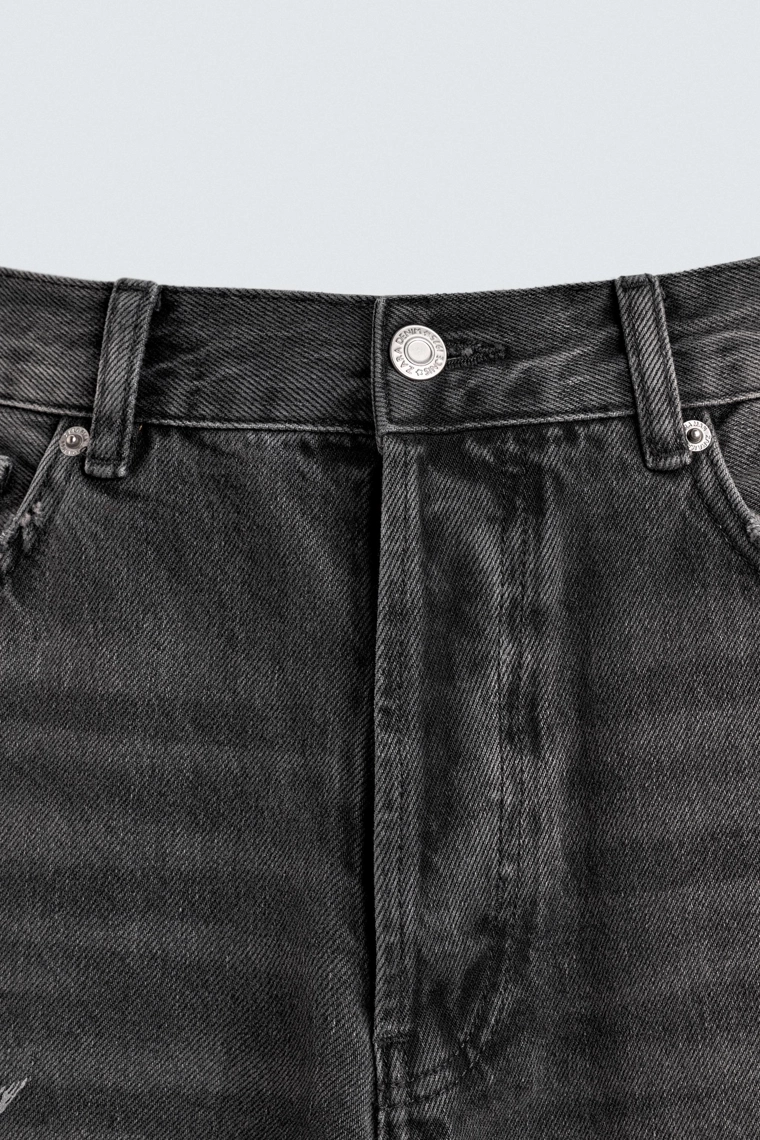 Джинсы свободного кроя с брызгами краски