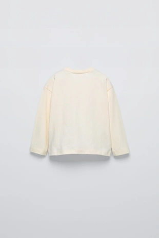 Лонгслив с бантами- Заказать в России