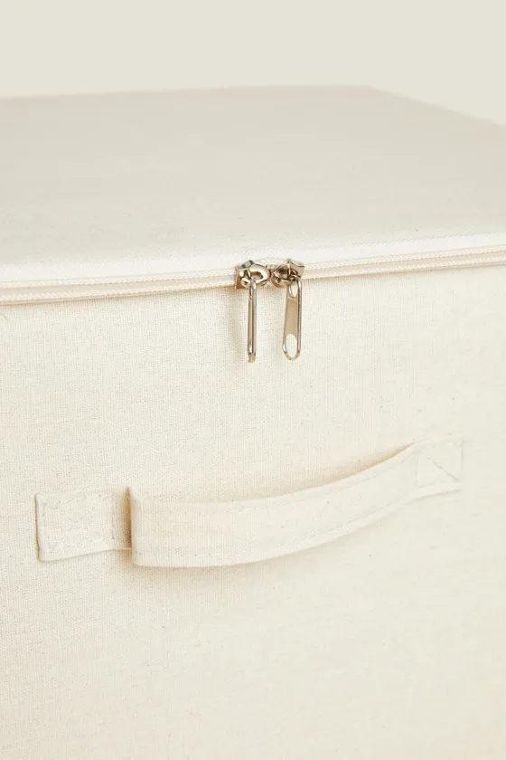 Foldable storage box with lid