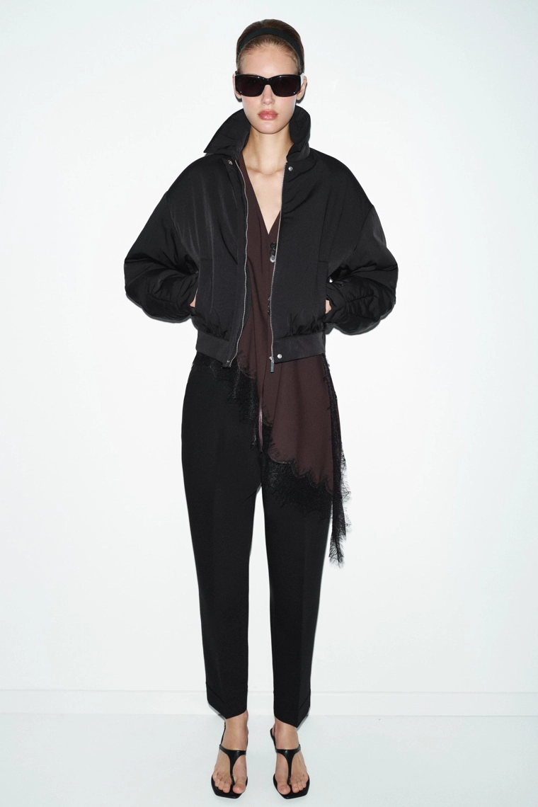 Штаны с защипами и отворотами