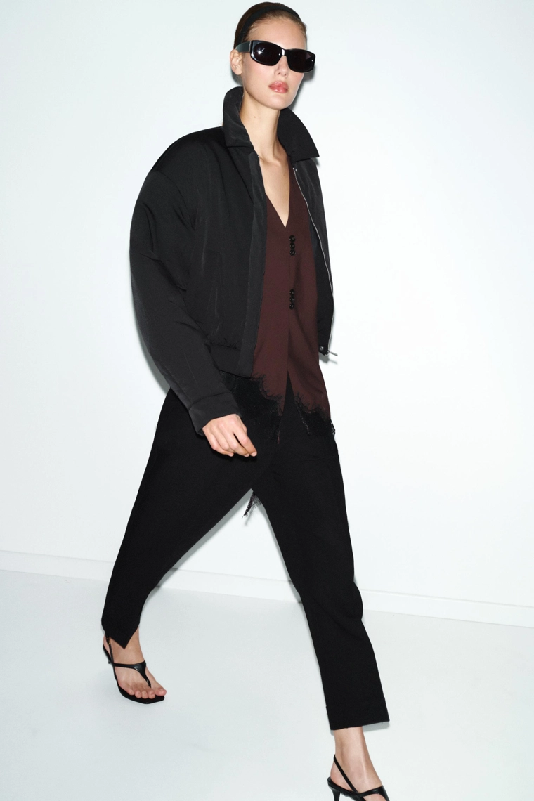 Штаны с защипами и отворотами